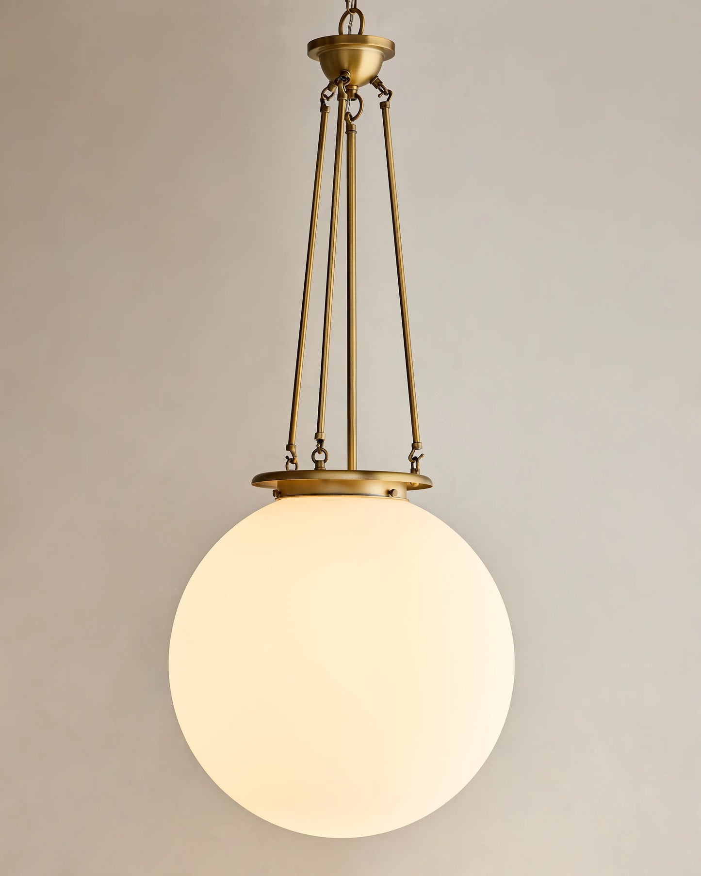 Antiqued Steel and Glass Globe Pendant Light - One Size / Brass